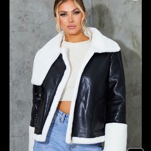 Never worn with tags PRETTY LITTLE THING black leather jacket with furry details